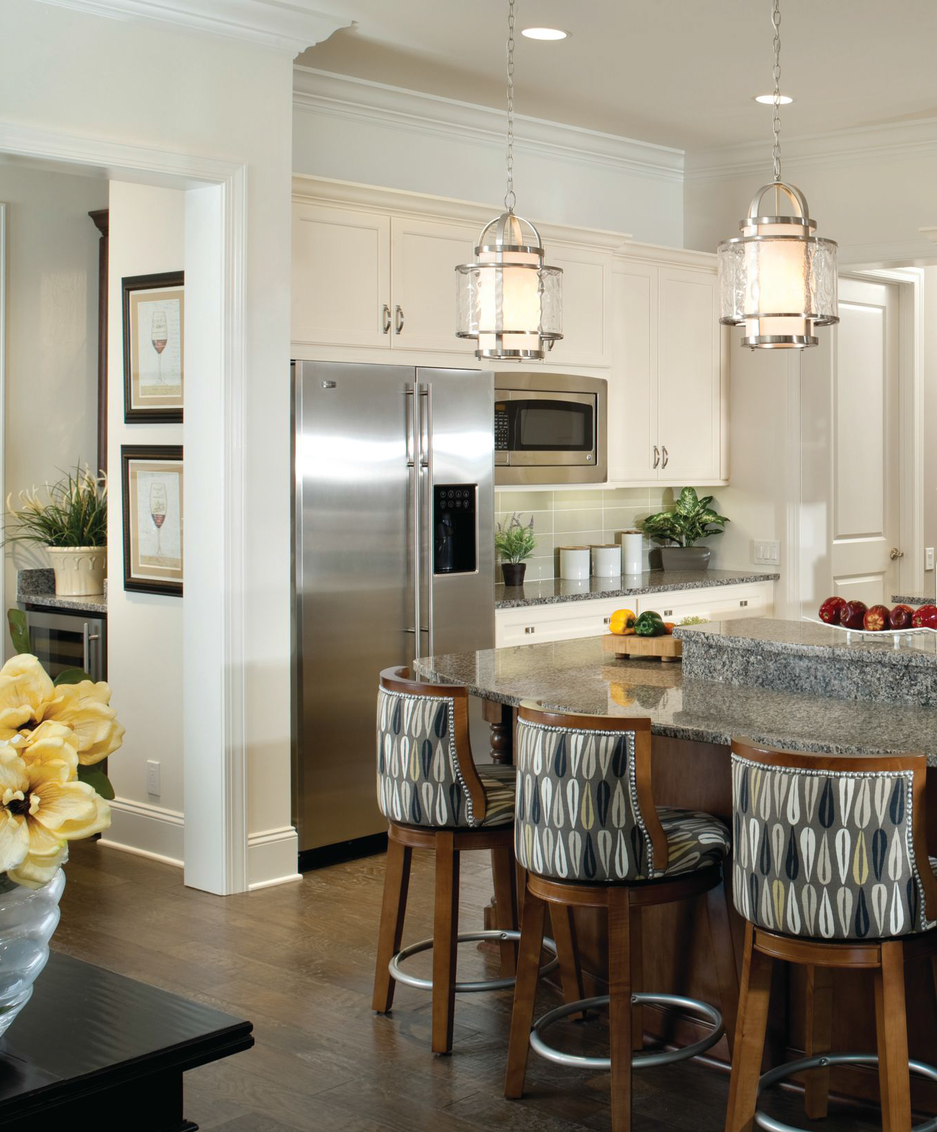 Bright kitchen with custom cabinets and island seating
